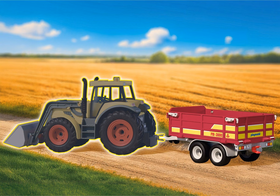Tractor con remolque cargado de fardos de heno