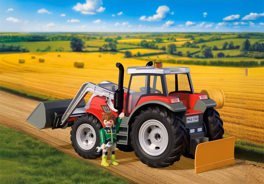 Tractor grande con fardos de heno
